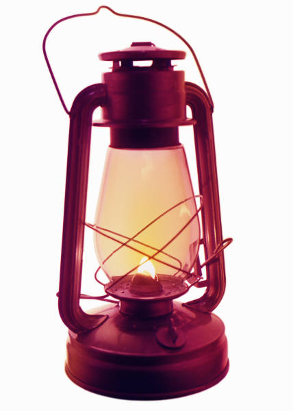 Photo of a lit camping lantern